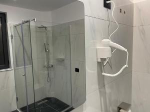 Koupelna v ubytování Hotel Tuyo