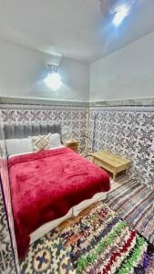 Postel nebo postele na pokoji v ubytování Riad Dar Lokman