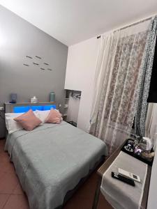 Postel nebo postele na pokoji v ubytování Da Vice Rooms