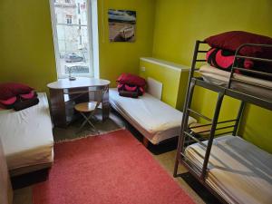 Postel nebo postele na pokoji v ubytování Hostel4You