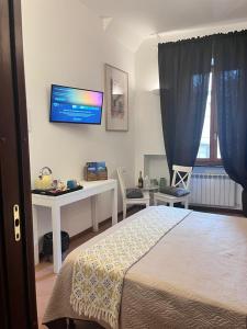 Postel nebo postele na pokoji v ubytování Da Vice Rooms