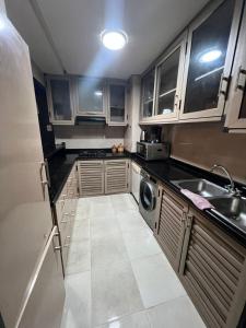 مطبخ أو مطبخ صغير في MARINA Agadir flat