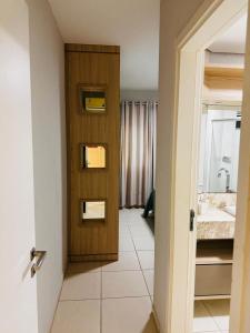 Ένα μπάνιο στο Apartamento Praia Mar Grosso 150 Metros do Mar
