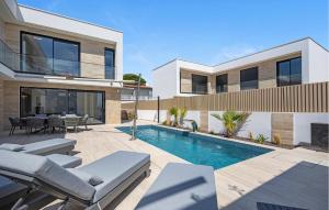 a villa with a swimming pool and a house at Me Paradise Villa Lavender in Tribunj +45 photos