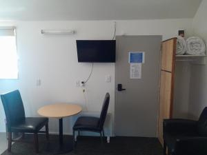 Et tv og/eller underholdning på Wellington 747 Motel