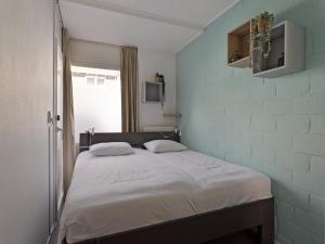 Ένα ή περισσότερα κρεβάτια σε δωμάτιο στο Apartment in Zoutelande near the Beach