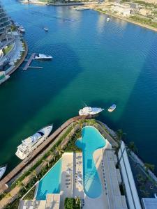 an aerial view of a body of water with boats at 2 BR Apartment in Marina Condo in Cancún