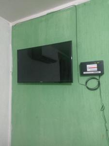 TV a/nebo společenská místnost v ubytování casa particular amueblada