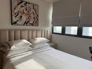 Rúm í herbergi á Stylish Apartment in Colombo
