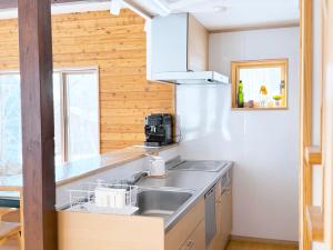 Kuchyň nebo kuchyňský kout v ubytování Sakura chalet 5 minute walk to the Rusutsu Resort + 21 fotografií