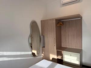 Rúm í herbergi á Stylish Apartment in Colombo