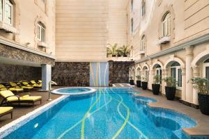 Πισίνα στο ή κοντά στο Grand Regency Doha, Trademark Collection by Wyndham