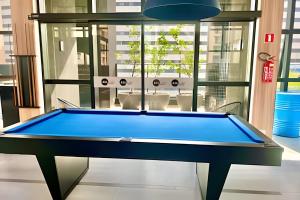 Foto dalla galleria di AMÁVEl, Studio com Ar Condicionado e Tv Smart a Curitiba