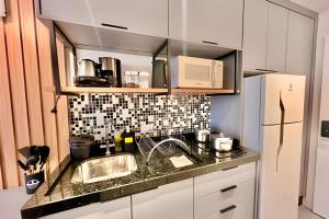 Cucina o angolo cottura di AMÁVEl, Studio com Ar Condicionado e Tv Smart