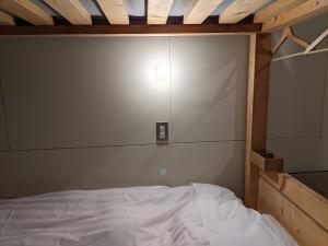 Ліжко або ліжка в номері Tomarotto Hostel