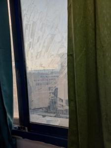 a view of the desert from a window at Partition in a shared apartment for rent in Abu Dhabi