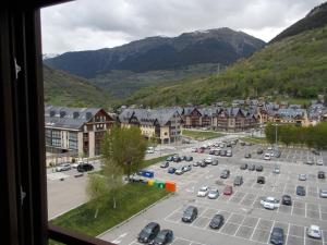 a view from a window of a parking lot at Ço d´Eric in Vielha