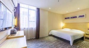 City Comfort Inn Zhanjiang Xuwen Port Wharf Chengdong客房内的一张或多张床位