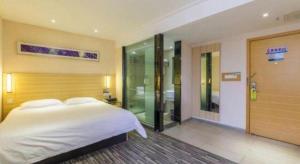 City Comfort Inn Zhanjiang Xuwen Port Wharf Chengdong客房内的一张或多张床位