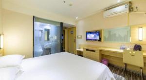City Comfort Inn Zhanjiang Xuwen Port Wharf Chengdong客房内的一张或多张床位