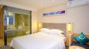 City Comfort Inn Zhanjiang Xuwen Port Wharf Chengdong客房内的一张或多张床位