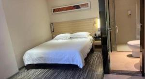 City Comfort Inn Zhanjiang Xuwen Port Wharf Chengdong客房内的一张或多张床位