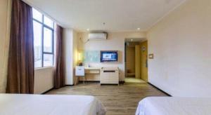 City Comfort Inn Zhanjiang Xuwen Port Wharf Chengdong客房内的一张或多张床位