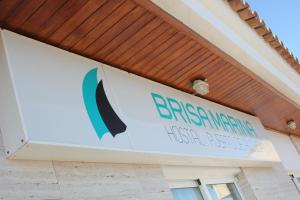 a sign for the emergency room at a hospital at Hostal Brisa Marina in Port d'Alcudia