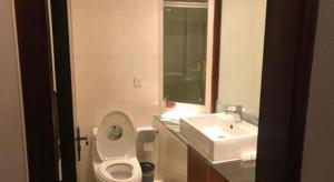 Koupelna v ubytování Shell Hotel Wuxi Jiangyin Zhutang Town