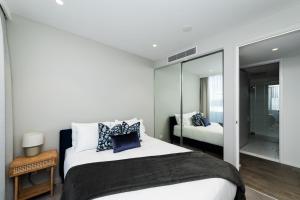 Ένα ή περισσότερα κρεβάτια σε δωμάτιο στο Pier 25 - 3 Bedroom Apartment Kingston Foreshore +24 φωτογραφίες