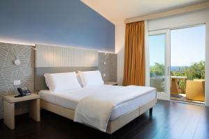 Giường trong phòng chung tại Bajaloglia Resort