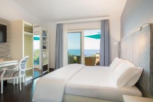 Giường trong phòng chung tại Bajaloglia Resort