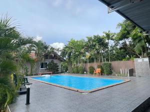 Bazén v ubytování Oh Taley Resort nebo v jeho okolí