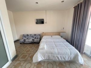 Postel nebo postele na pokoji v ubytování Oh Taley Resort