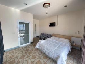 Postel nebo postele na pokoji v ubytování Oh Taley Resort