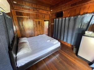 Postel nebo postele na pokoji v ubytování Oh Taley Resort
