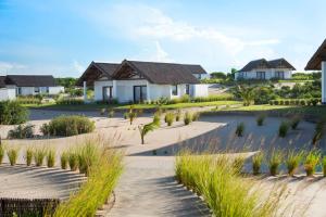 Zahrada ubytování Mequfi Beach Resort