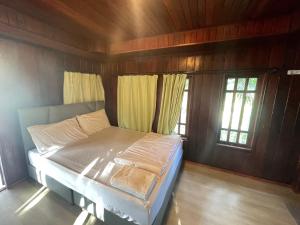 Postel nebo postele na pokoji v ubytování Oh Taley Resort + 37 fotografií