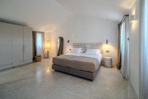 a bedroom with a large bed in a room at Villa Kaleta Brac in Sutivan +113 photos