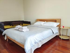 Krevet ili kreveti u jedinici u okviru objekta Yuan Apartment