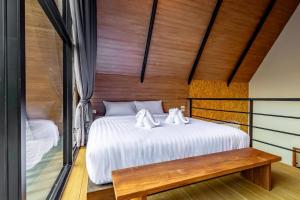 Postel nebo postele na pokoji v ubytování Hom I Din Farm and Homestay