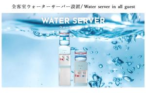 a picture of two bottles of water in the water at Hotel Asian Color (Adult Only) in Tokyo