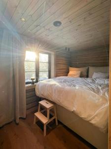 Ένα ή περισσότερα κρεβάτια σε δωμάτιο στο Timber Cabin By The Ski Slopes In Oppdal