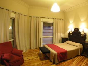 Posteľ alebo postele v izbe v ubytovaní Hostal Canovas