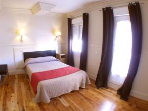 Posteľ alebo postele v izbe v ubytovaní Hostal Canovas