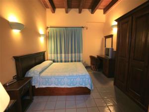 Postel nebo postele na pokoji v ubytování Hotel dell'Ancora
