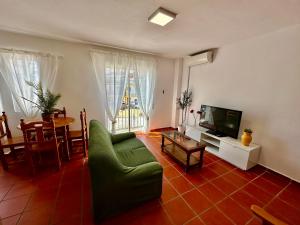 TV a/nebo společenská místnost v ubytování Hostal Sango Sierra de las Nieves