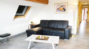 Istumisnurk majutusasutuses La maison du Vignoble