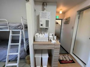 Voodi või voodid majutusasutuse 福井駅東口から徒歩10分駐車2台可スーパーまで2分民泊 eclat エクラ 城東 toas
