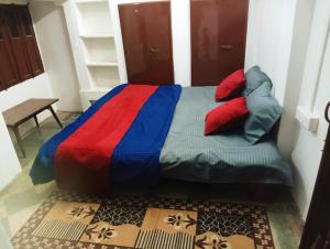 Postel nebo postele na pokoji v ubytování Ramaya Homestay
